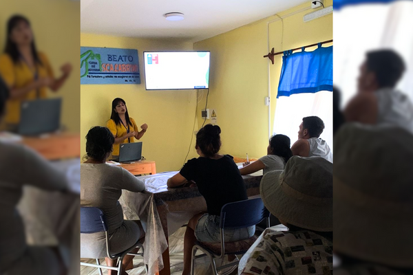 Abogada de Unidad de Migración de Arica y Parinacota visita Fundación Scalabrini